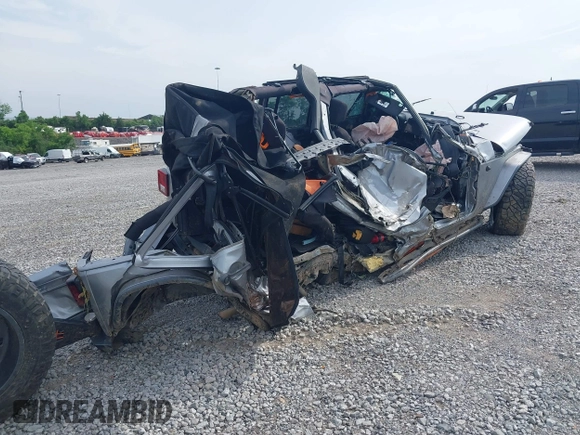 2015 Jeep Wrangler Unlimited Freedom with VIN 1C4BJWDG3FL682296, listed as a IAAI auction lot 42275536 with Not provided miles and . Bid and sale history available at DreamBid. Image 4.