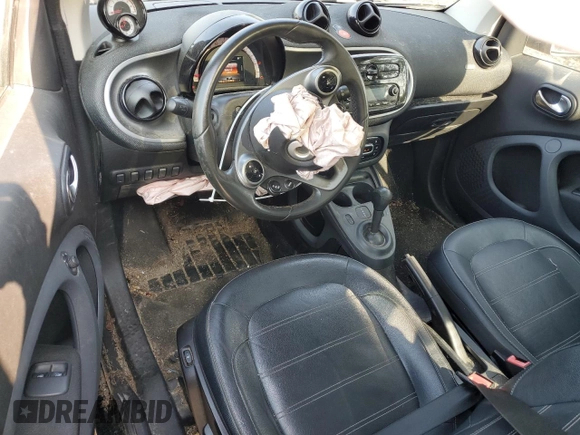2016 Smart fortwo Passion с VIN WMEFJ5DA7GK066701, выставлен на аукционе Copart как лот 59093055 с пробегом 84 417 миль миль и Списание • Salvage title. История ставок и продаж доступна на DreamBid. Изображение 8.