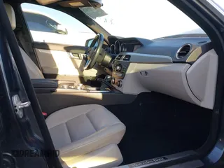 2014 Mercedes-Benz C-Class C 250 Sport with VIN WDDGF4HB1EG239751, listed as a IAAI auction lot 39149563 with 103,454 mi miles. Bid and sale history available at carsss.com. Image 5.
