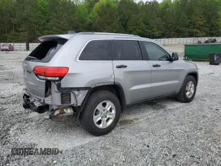 2014 Jeep Grand Cherokee Laredo with VIN 1C4RJEAG2EC179547, listed as a Copart auction lot 53328055 with 107,451 mi miles and Salvage Title. Bid and sale history available at DreamBid. Image 3.