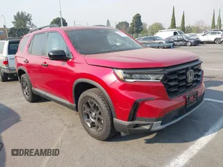 2023 Honda Pilot TrailSport with VIN 5FNYG1H65PB042687, listed as a IAAI auction lot 41259661 with 11,359 mi miles. Bid and sale history available at carsss.com. Image 1.
