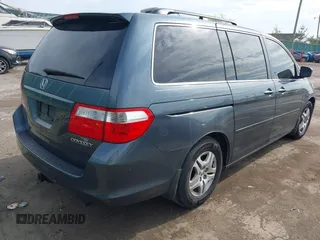2005 Honda Odyssey EX-L with VIN 5FNRL38645B421253, listed as a IAAI auction lot 42106184 with 157,717 mi miles. Bid and sale history available at carsss.com. Image 4.