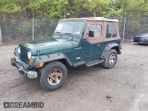 1999 Jeep Wrangler SE with VIN 1J4FY29P9XP467850, listed as a IAAI auction lot 42029322 with 250,884 mi miles. Bid and sale history available at carsss.com. Image 2.