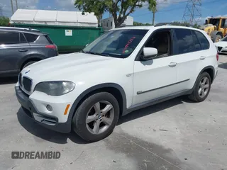 2007 BMW X5 3.0si with VIN 5UXFE43597LY81203, listed as a IAAI auction lot 41943214 with 178,497 mi miles. Bid and sale history available at carsss.com. Image 2.
