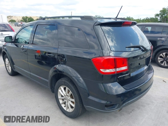 2015 Dodge Journey SXT with VIN 3C4PDCBG5FT604847, listed as a IAAI auction lot 42108853 with 164,679 mi miles. Bid and sale history available at carsss.com. Image 3.