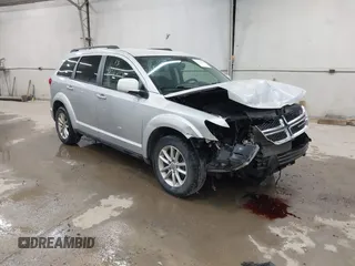 2013 Dodge Journey SXT with VIN 3C4PDDBG1DT631773, listed as a IAAI auction lot 42662156 with 163,715 mi miles and . Bid and sale history available at DreamBid. Image 1.