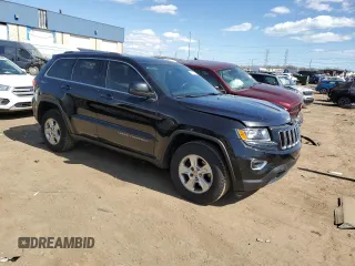 2014 Jeep Grand Cherokee Laredo with VIN 1C4RJFAG0EC242229, listed as a Copart auction lot 53300335 with 191,209 mi miles and Salvage Title. Bid and sale history available at DreamBid. Image 4.