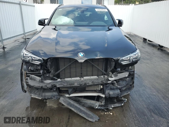 2022 BMW X4 M z VIN 5YM23EC02N9K93385, wystawiony jako Copart lot #53954854 z przebiegiem 17 189 mil mil oraz . Historia ofert i sprzedaży dostępna na DreamBid. Obrazek 5.
