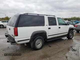 1997 GMC Suburban z VIN 1GKGK26JXVJ715765, wystawiony jako Copart lot #73188284 z przebiegiem 301 101 mil mil oraz Szkoda całkowita • Salvage title. Historia ofert i sprzedaży dostępna na DreamBid. Obrazek 3.
