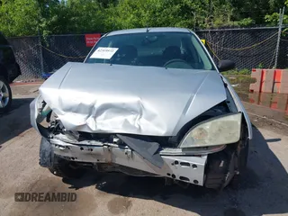 2007 Ford Focus S with VIN 1FAFP34N47W188757, listed as a IAAI auction lot 42319572 with 197,091 mi miles and . Bid and sale history available at DreamBid. Image 13.