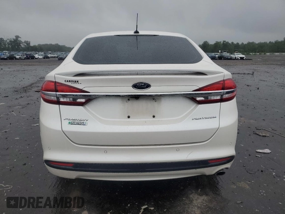 2017 Ford Fusion Titanium z VIN 3FA6P0SUXHR268559, wystawiony jako Copart lot #57456085 z przebiegiem 124 072 mil mil oraz Szkoda całkowita • Salvage title. Historia ofert i sprzedaży dostępna na DreamBid. Obrazek 6.
