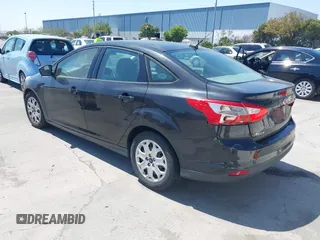 2012 Ford Focus SE with VIN 1FAHP3F24CL471005, listed as a IAAI auction lot 42726292 with 162,750 mi miles and . Bid and sale history available at DreamBid. Image 3.