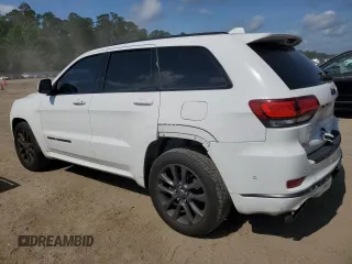 2018 Jeep Grand Cherokee High Altitude with VIN 1C4RJECG1JC260482, listed as a Copart auction lot 57310115 with 144,320 mi miles and Salvage title. Bid and sale history available at DreamBid. Image 2.