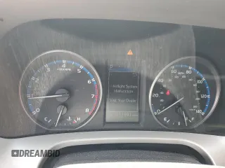 2018 Toyota RAV4 XLE with VIN 2T3WFREV7JW423768, listed as a Copart auction lot 61841875 with 111,991 mi miles and Salvage title. Bid and sale history available at DreamBid. Image 9.