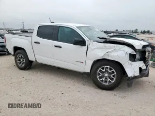 2022 GMC Canyon 4WD AT4 z VIN 1GTG6FEN2N1210072, wystawiony jako Copart lot #57084565 z przebiegiem 64 897 mil mil oraz Szkoda całkowita • Salvage title. Historia ofert i sprzedaży dostępna na DreamBid. Obrazek 4.