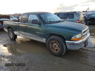 2001 Dodge Dakota z VIN 1B7GL22X51S315149, wystawiony jako Copart lot #41628735 z przebiegiem 295 276 mil mil oraz Czysty tytuł • Clean title. Historia ofert i sprzedaży dostępna na DreamBid. Obrazek 4.