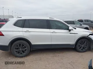 2023 Volkswagen Tiguan SE with VIN 3VVNB7AX8PM099759, listed as a IAAI auction lot 41340885 with 28,562 mi miles and . Bid and sale history available at DreamBid. Image 13.