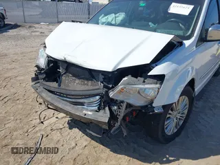 2015 Chrysler Town & Country Touring L with VIN 2C4RC1CG9FR547098, listed as a IAAI auction lot 42135624 with 61,364 mi miles and . Bid and sale history available at DreamBid. Image 6.