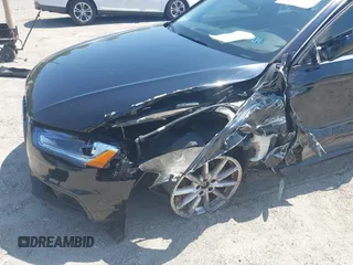 2014 Audi A4 Premium Plus z VIN WAUFFAFL3EN038278, wystawiony jako IAAI lot #42340189 z przebiegiem 167 870 mil mil oraz . Historia ofert i sprzedaży dostępna na DreamBid. Obrazek 6.
