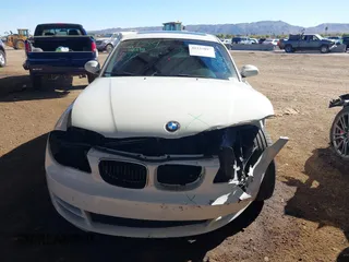 2009 BMW 1 Series 128i with VIN WBAUP73549VK74523, listed as a IAAI auction lot 41337097 with 108,608 mi miles and . Bid and sale history available at carsss.com. Image 6.