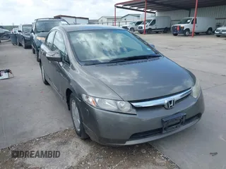 2006 Honda Civic z VIN JHMFA36256S022573, wystawiony jako IAAI lot #42439556 z przebiegiem 112 849 mil mil oraz . Historia ofert i sprzedaży dostępna na DreamBid. Obrazek 1.