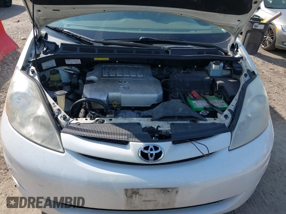 2009 Toyota Sienna XLE with VIN 5TDZK22C19S262107, listed as a IAAI auction lot 42158864 with 186,711 mi miles. Bid and sale history available at carsss.com. Image 10.