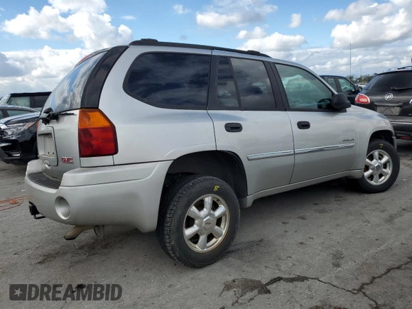 2006 GMC Envoy SLE with VIN 1GKDT13S462228967, listed as a Copart auction lot 73669484 with 233,349 mi miles and Salvage Title. Bid and sale history available at DreamBid. Image 3.