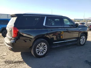 2022 GMC Yukon SLT with VIN 1GKS2BKD5NR356479, listed as a Copart auction lot 77674304 with 33,580 mi miles and Salvage Title. Bid and sale history available at carsss.com. Image 3.