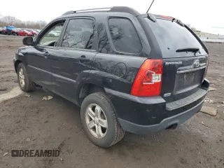 2009 Kia Sportage LX with VIN KNDJE723097622429, listed as a Copart auction lot 52960575 with 167,492 mi miles and Salvage Title. Bid and sale history available at carsss.com. Image 2.