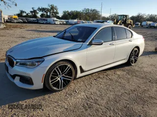2016 BMW 7 Series 750i xDrive with VIN WBA7B0C59GG526741, listed as a Copart auction lot 86312384 with 90,360 mi miles and Salvage title. Bid and sale history available at DreamBid. Image 1.