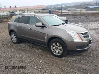 2011 Cadillac SRX Luxury Collection with VIN 3GYFNAEY9BS571833, listed as a IAAI auction lot 41983443 with 183,761 mi miles. Bid and sale history available at carsss.com. Image 1.