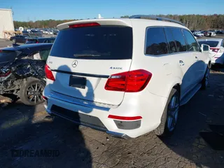 2016 Mercedes-Benz GL with VIN 4JGDF7DE6GA703049, listed as a IAAI auction lot 41063570 with 116,736 mi miles. Bid and sale history available at carsss.com. Image 4.