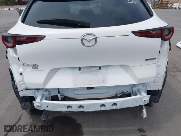 2023 Mazda CX-30 S Carbon Edition with VIN 3MVDMBCM0PM569100, listed as a IAAI auction lot 41978191 with 20,470 mi miles and . Bid and sale history available at DreamBid. Image 18.