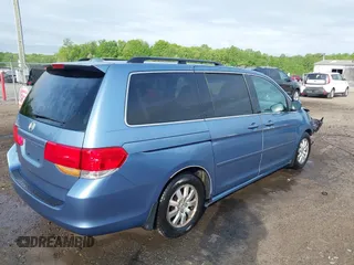 2010 Honda Odyssey EX-L with VIN 5FNRL3H63AB075187, listed as a IAAI auction lot 42114126 with 131,272 mi miles. Bid and sale history available at carsss.com. Image 4.