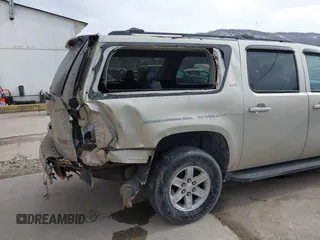 2014 GMC Yukon XL SLT with VIN 1GKS2KE71ER223496, listed as a IAAI auction lot 41419800 with 146,686 mi miles. Bid and sale history available at carsss.com. Image 6.
