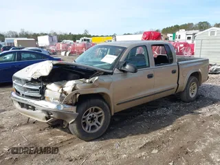 2003 Dodge Dakota SLT with VIN 1D7HL48X53S348636, listed as a IAAI auction lot 41329221 with 133,075 mi miles. Bid and sale history available at carsss.com. Image 17.