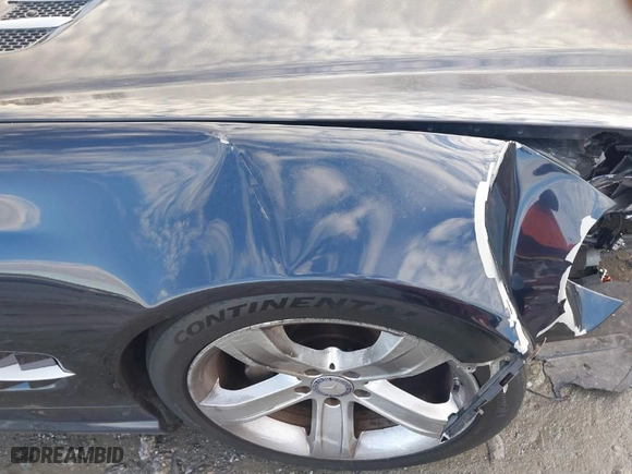 2009 Mercedes-Benz SL-Class V8 with VIN WDBSK71F29F143653, listed as a IAAI auction lot 41310556 with 115,377 mi miles. Bid and sale history available at carsss.com. Image 17.