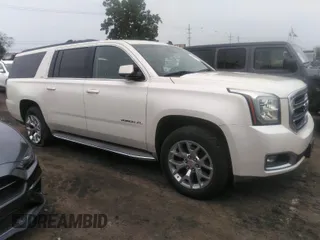 2015 GMC Yukon XL SLT with VIN 1GKS2HKC1FR120133, listed as a IAAI auction lot 39693190 with 211,652 mi miles. Bid and sale history available at carsss.com. Image 1.