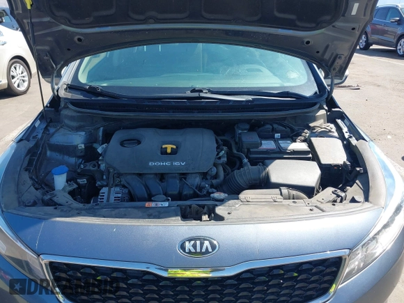 2018 Kia Forte LX with VIN 3KPFL4A77JE220538, listed as a IAAI auction lot 42095964 with 98,977 mi miles and . Bid and sale history available at DreamBid. Image 10.
