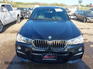 2016 BMW X4 M40i z VIN 5UXXW7C59G0M91223, wystawiony jako IAAI lot #42009394 z przebiegiem 144 771 mil mil oraz . Historia ofert i sprzedaży dostępna na DreamBid. Obrazek 12.