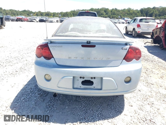 2004 Dodge Stratus SXT z VIN 4B3AG42G64E146011, wystawiony jako Copart lot #70186364 z przebiegiem 184 795 mil mil oraz Szkoda całkowita • Salvage title. Historia ofert i sprzedaży dostępna na DreamBid. Obrazek 6.