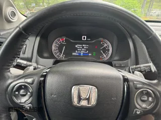 2018 Honda Pilot Touring z VIN 5FNYF6H94JB070661, wystawiony jako Copart lot #60926415 z przebiegiem 205 538 mil mil oraz Czysty tytuł • Clean title. Historia ofert i sprzedaży dostępna na DreamBid. Obrazek 8.