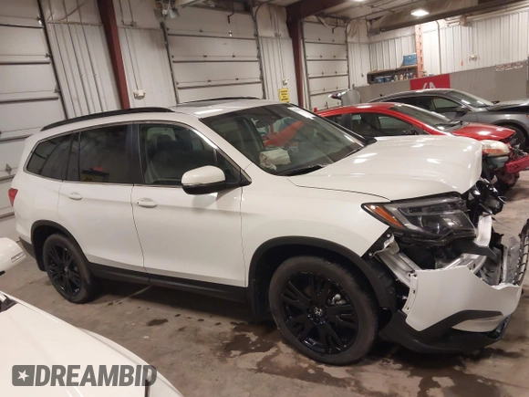 2022 Honda Pilot Special Edition with VIN 5FNYF6H27NB105041, listed as a IAAI auction lot 41916708 with 15,848 mi miles and . Bid and sale history available at DreamBid. Image 14.