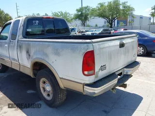 1999 Ford F-150 XL with VIN 2FTRX18L8XCB22793, listed as a IAAI auction lot 42016740 with 198,056 mi miles. Bid and sale history available at carsss.com. Image 3.
