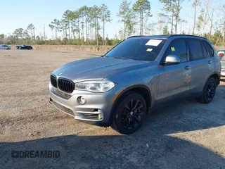 2016 BMW X5 xDrive40e with VIN 5UXKT0C57G0S75476, listed as a IAAI auction lot 41642249 with 105,489 mi miles and . Bid and sale history available at DreamBid. Image 18.