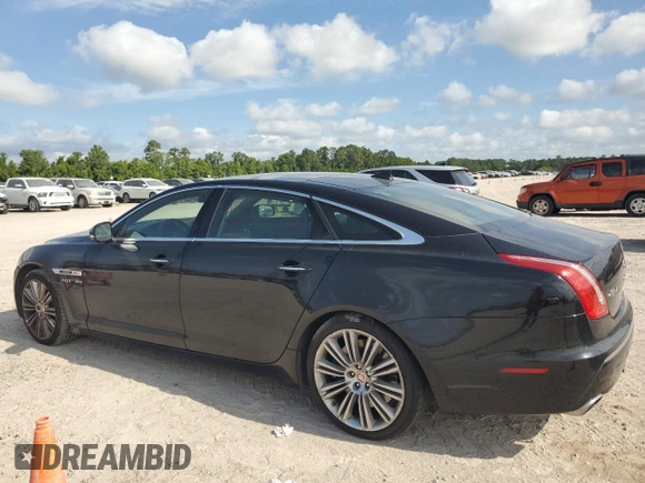 2014 Jaguar XJ with VIN SAJWA2GT0EMV61531, listed as a Copart auction lot 61071054 with 79,266 mi miles and Clean Title. Bid and sale history available at DreamBid. Image 2.