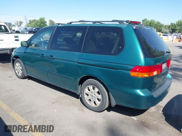2002 Honda Odyssey EX z VIN 2HKRL18632H582789, wystawiony jako IAAI lot #42481029 z przebiegiem 272 380 mil mil oraz . Historia ofert i sprzedaży dostępna na DreamBid. Obrazek 3.