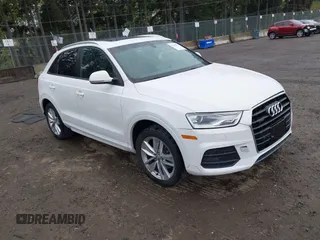 2017 Audi Q3 Premium z VIN WA1ECCFS5HR003565, wystawiony jako IAAI lot #42140711 z przebiegiem 74 034 mil mil oraz . Historia ofert i sprzedaży dostępna na DreamBid. Obrazek 1.