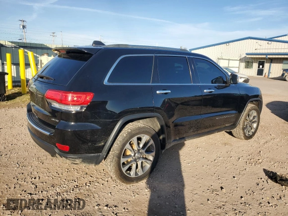 2018 Jeep Grand Cherokee Limited with VIN 1C4RJFBT9JC200504, listed as a Copart auction lot 80481684 with 104,398 mi miles and Salvage title. Bid and sale history available at DreamBid. Image 3.
