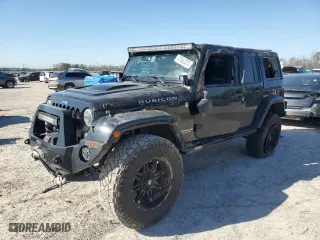 2015 Jeep Wrangler Unlimited Rubicon Hard Rock with VIN 1C4HJWFG1FL710264, listed as a Copart auction lot 47563975 with 96,737 mi miles and Salvage Title. Bid and sale history available at carsss.com. Image 1.